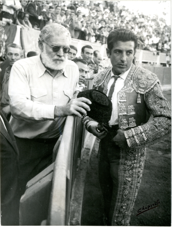 Hemingway and Ordonez Stand at the Edge of the Ring at a Bullfight